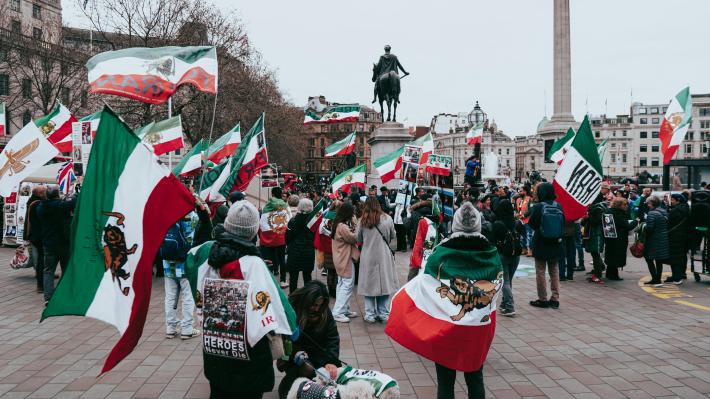 People gather at Trafalgar Square in London for a protest in support of human rights defenders and protesters in Iran on Feb. 4, 2023. (Photo by Artūras Kokorevas/Pexels)